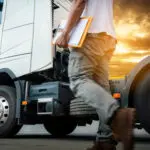 Truck Drivers Checking The Truck's Safety Maintenance Checklist.