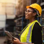 Happy Black African Women Engineer Worker Enjoy Working In Facto