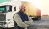 Delivery, Container And Happy Truck Driver Moving Industry Cargo And Freight At A Shipping Supply Chain Or Warehouse. Smile, Industrial And Black Man Ready To Transport Ecommerce Trade Goods Or Stock