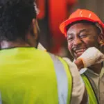 Teamwork African American Worker In The Factory.black Man Afro W