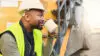 Coffee, Engineer And Construction Worker Relax On Break At Construction Site, Smiling And Inspired By Building Idea And Vision. Engineering, Motivation And Black Man Happy About Project Development