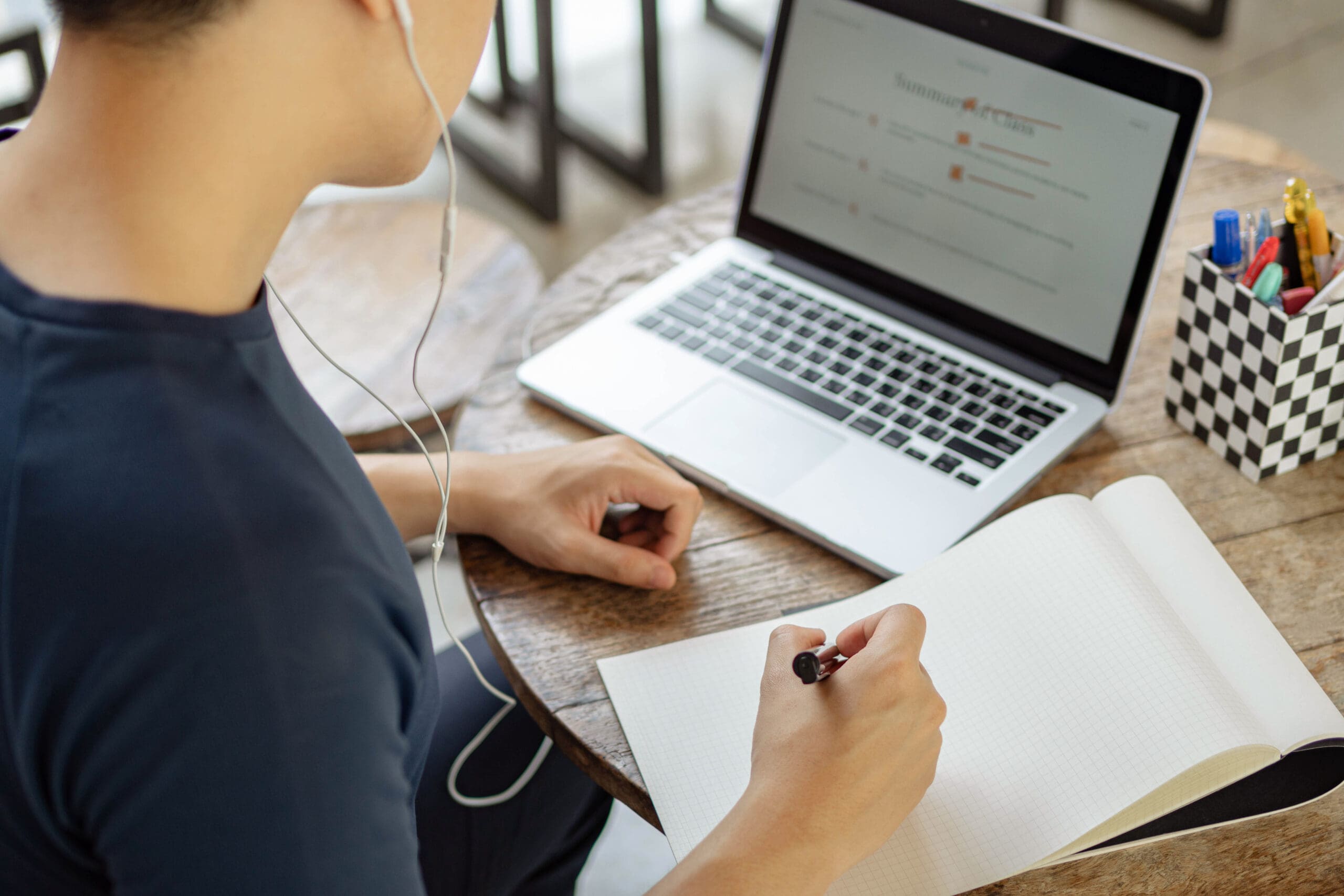 Online Studying Concept A Black Haired Student Doing His Homewor