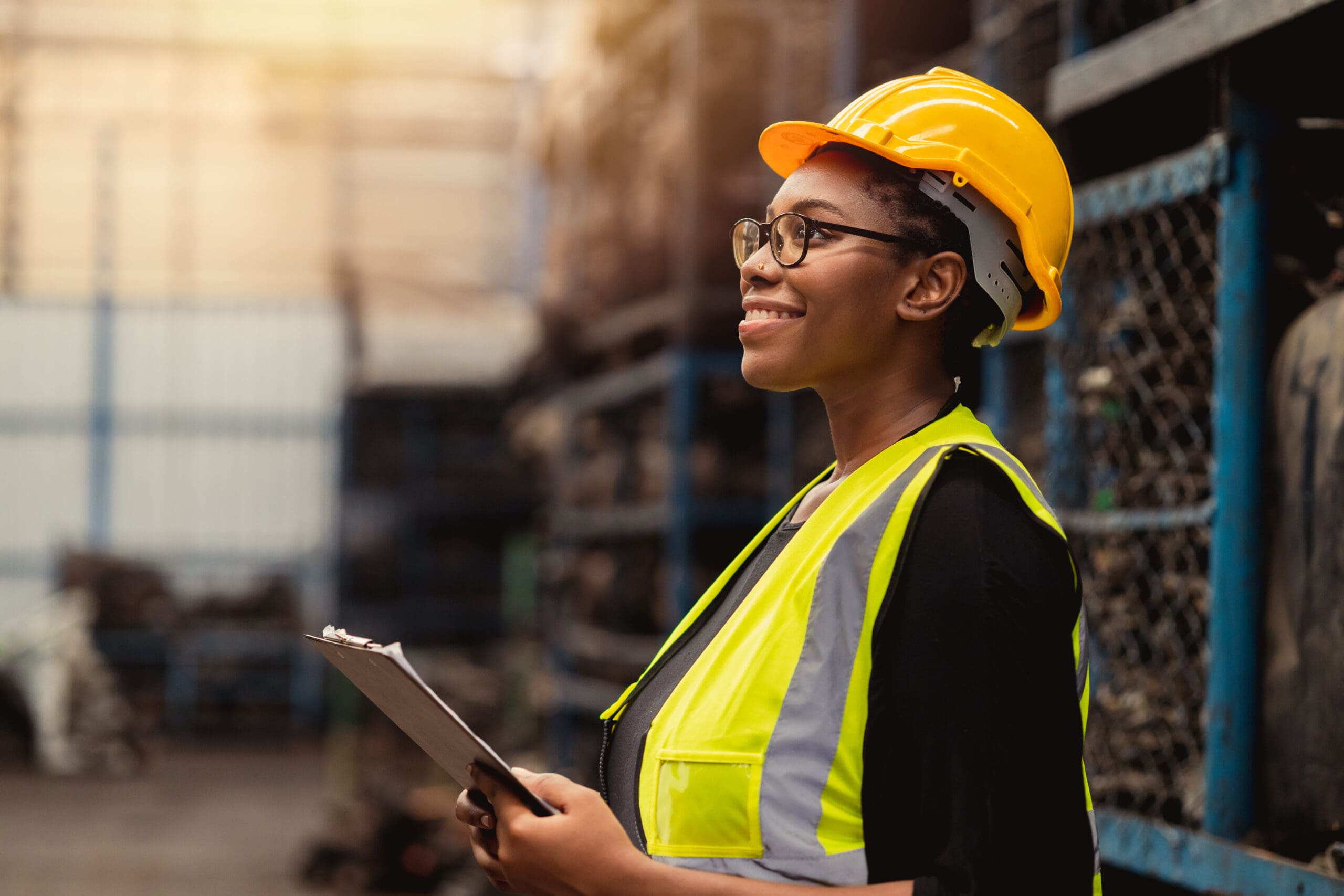 Happy Black African Women Engineer Worker Enjoy Working In Facto