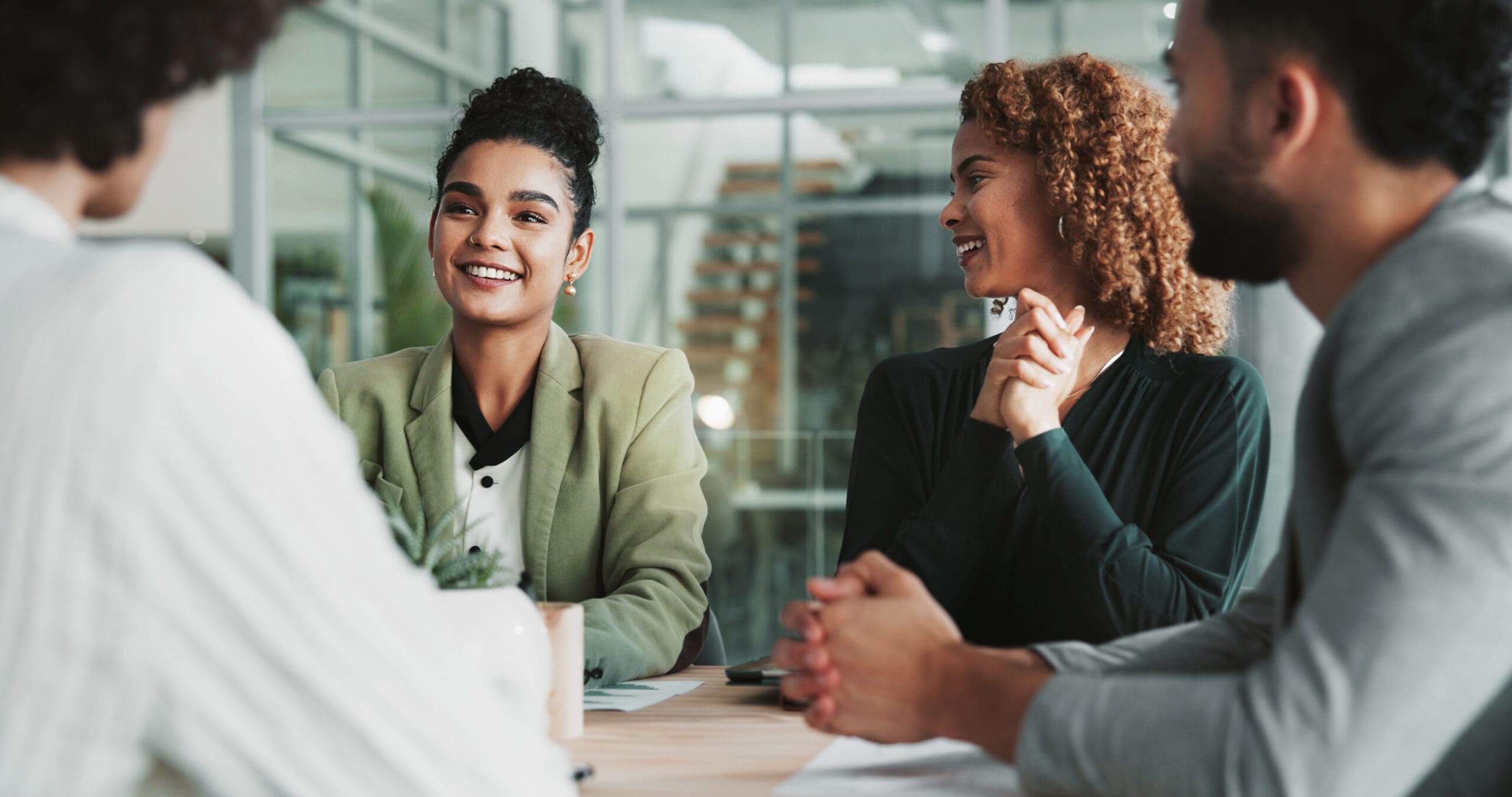 Meeting, Planning And Review With Business People In Boardroom Of Office Together For Collaboration. Feedback, Project Management And Smile With Employee Team In Workplace For Development Or Strategy
